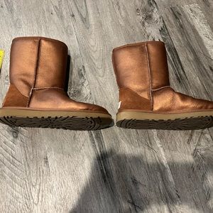 UGG copper mid size boots. Currently unavailable everywhere. Size 8 brand new.